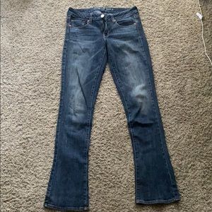 Medium wash skinny kick jeans